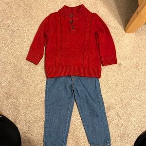Boys red sweater and jeans